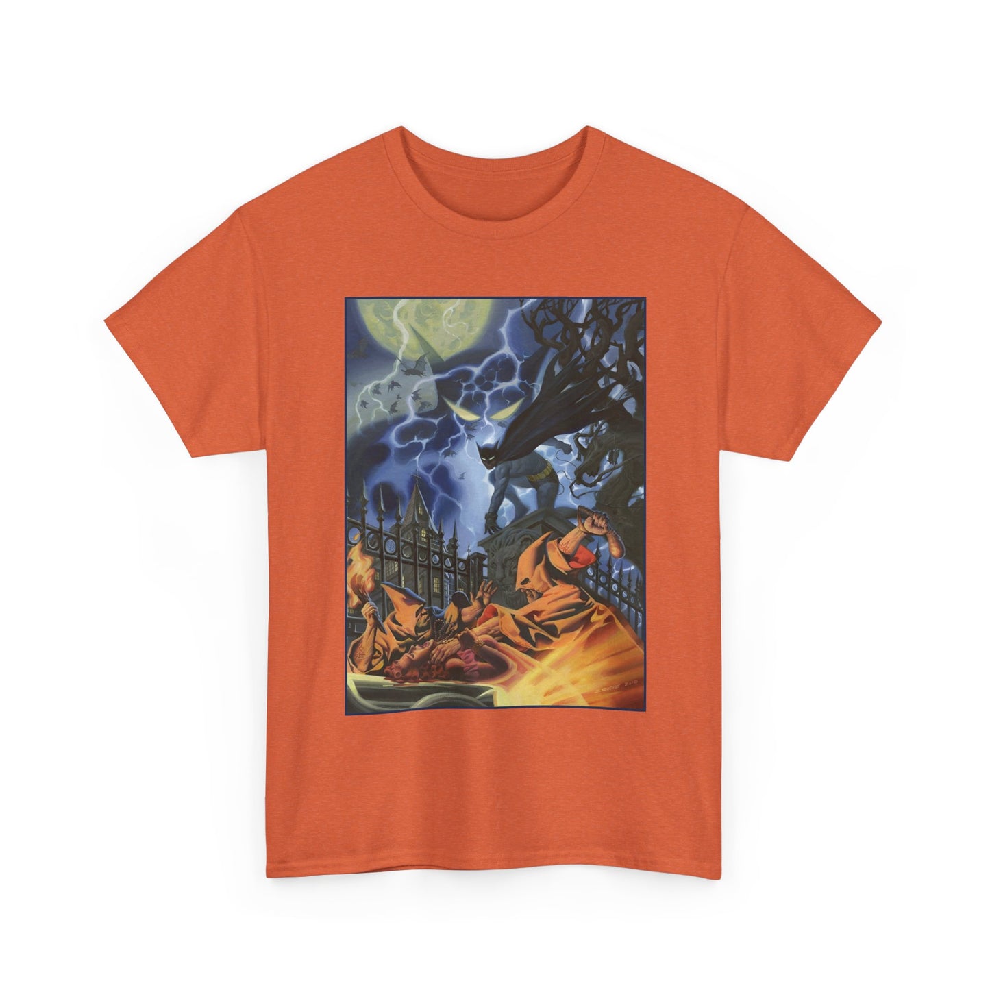 Orange t-shirt with a graphic design of Batman fighting violent cultists under a moonlit sky on a white background.