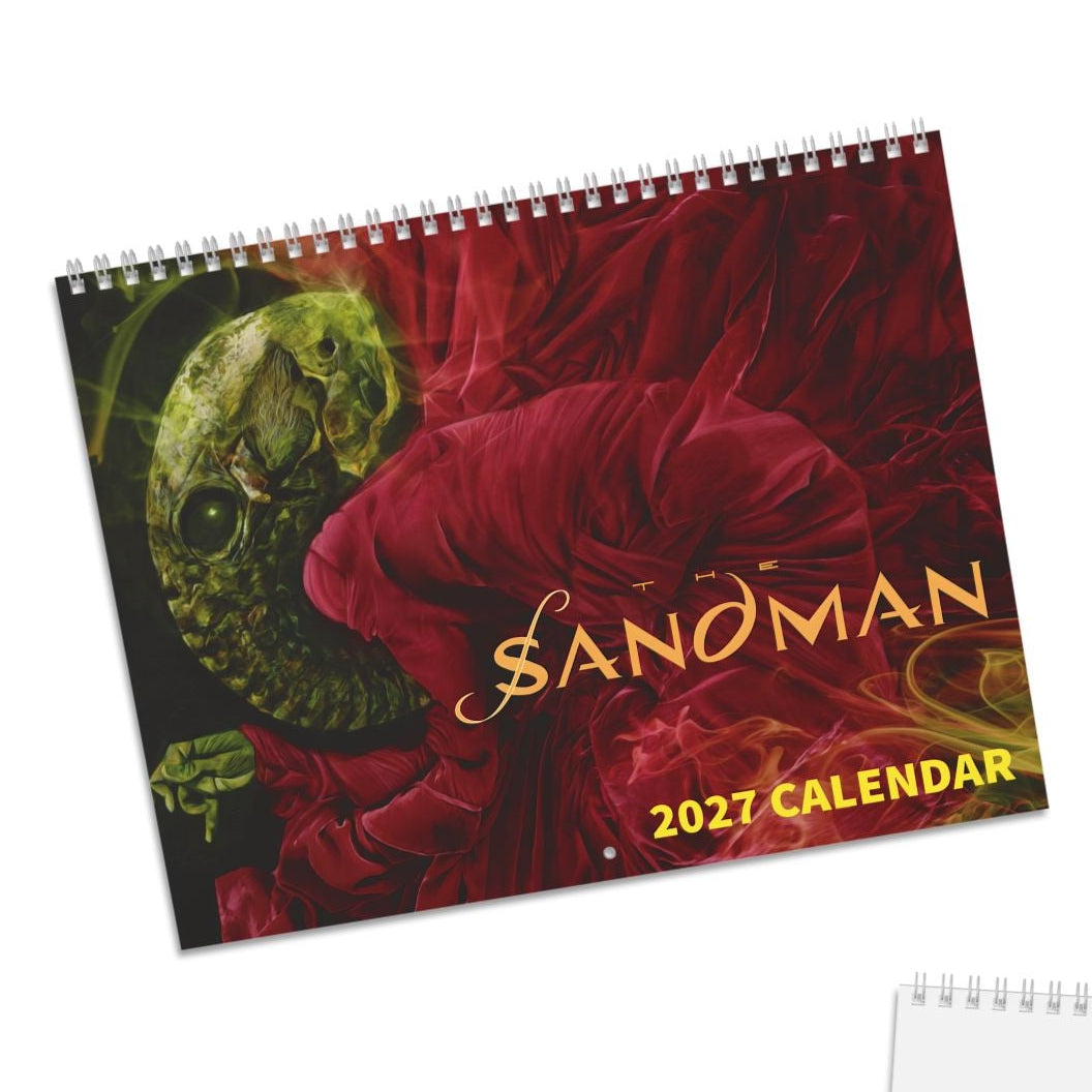 A spiral-bound 2027 calendar titled 'Sandman' shown in two views on a white background: the front cover features a dark red floral design with a green mask and gold lettering, and the back cover is plain white with a small printed cover image in the lower-left corner.