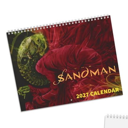 A spiral-bound 2027 calendar titled 'Sandman' shown in two views on a white background: the front cover features a dark red floral design with a green mask and gold lettering, and the back cover is plain white with a small printed cover image in the lower-left corner.