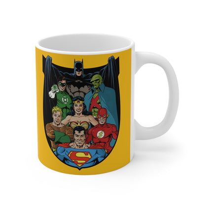 Mug with Justice League design featuring Superman, Wonder Woman, and Batman on a yellow background