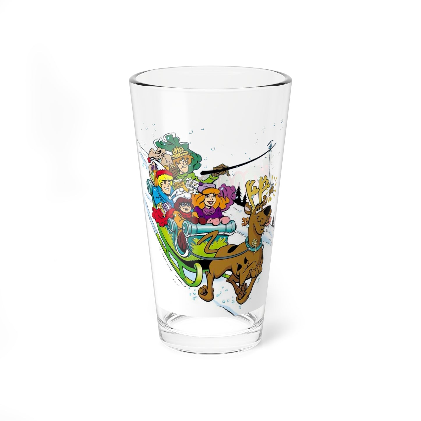 Clear pint glass with Scooby Doo and the gang in a winter sleigh on a white background