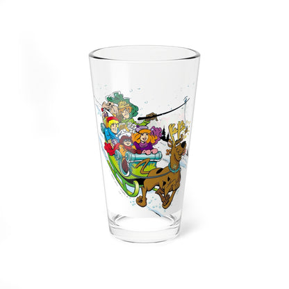 Clear pint glass with Scooby Doo and the gang in a winter sleigh on a white background